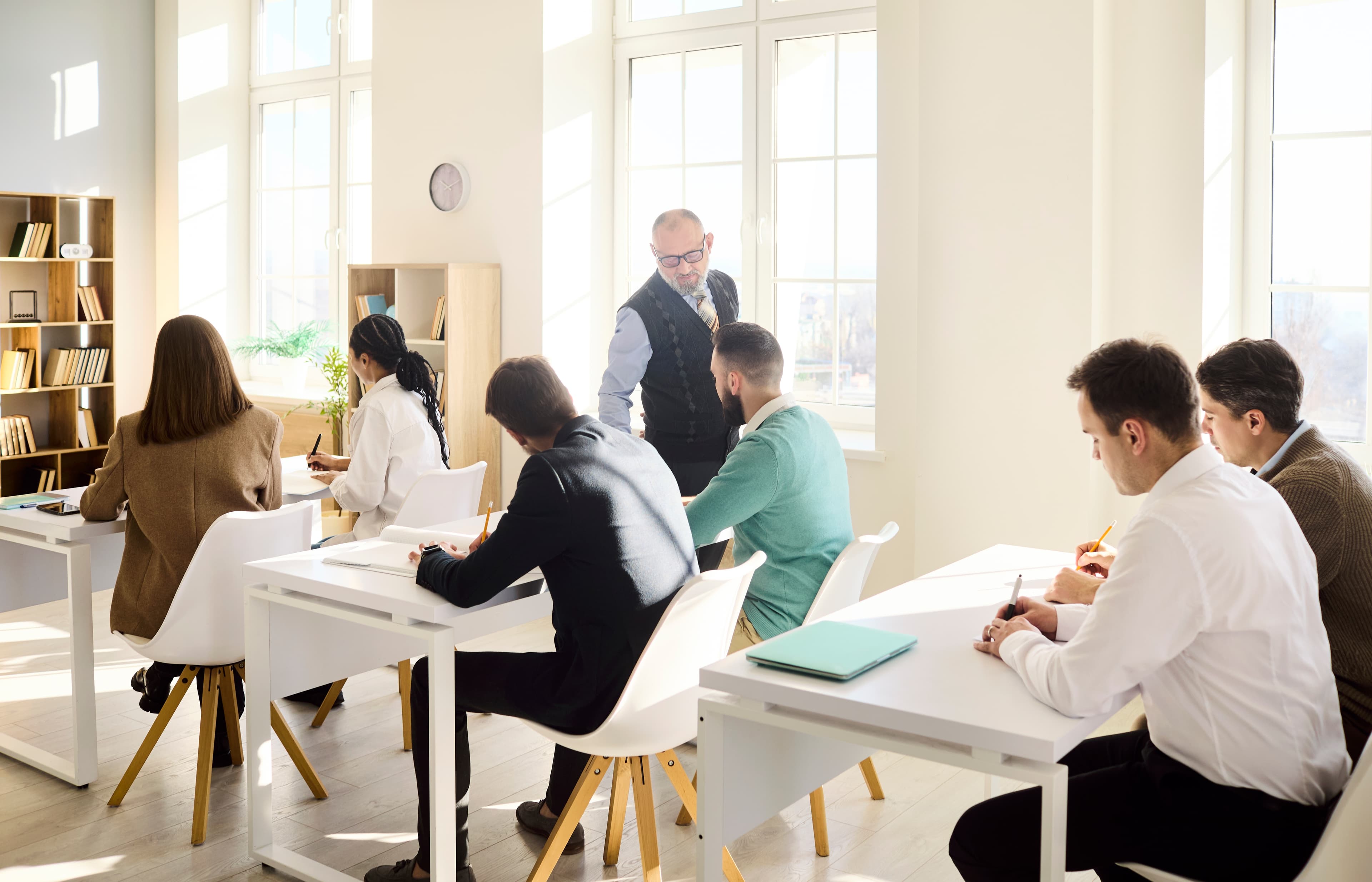 Executive learners and international students in a modern classroom